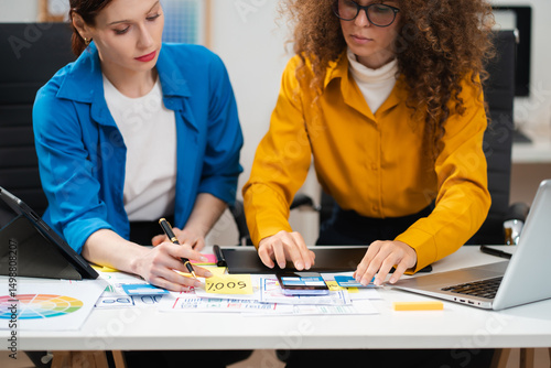Принти на полотні Two caucasian designer meeting concept design ideas at office.