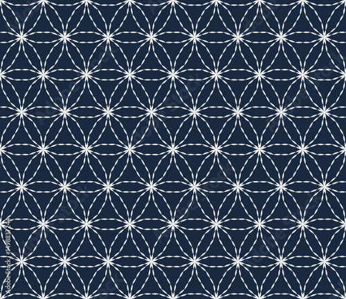 Sashiko embroidery seamless vector pattern. Needlework fabric design. Japanese embroidery ornament with white stitches on the indigo blue background. Suitable for clothing, textiles.