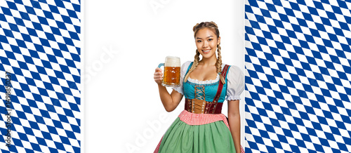 young asian woman in dirndl...