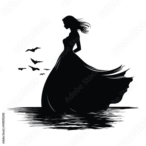 A dress flowing in the wind on a beach black silhouette
