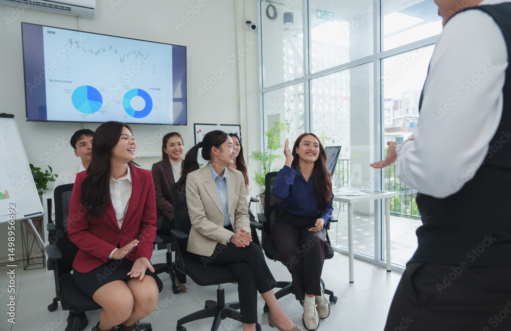 Fototapeta premium Businesswoman raising hand during a conference meeting with her colleagues
