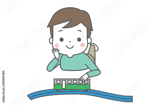電車のおもちゃで遊んでいる男の子