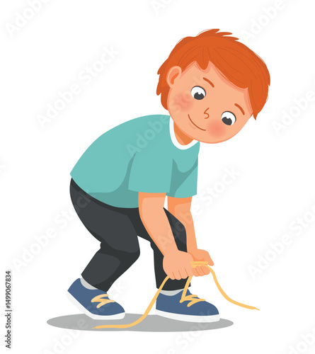 Cute little boy tying his shoelaces
