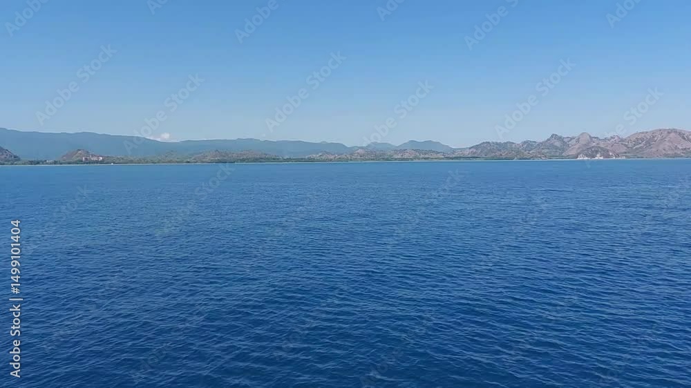 beautiful view of the vast blue ocean with brown and dry hills in the waters of Labuan Bajo
beautiful view of the vast blue ocean with brown and dry hills in the waters of Labuan Bajo