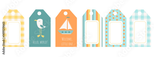 Set of cute marine-themed baby tags with different designs