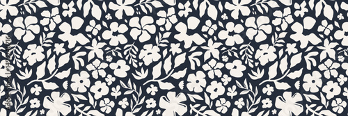 Elegant seamless pattern with hand drawn black floral silhouettes on a white background. Modern botanical design with flowers and leaves for textiles, wallpaper, packaging, and creative projects