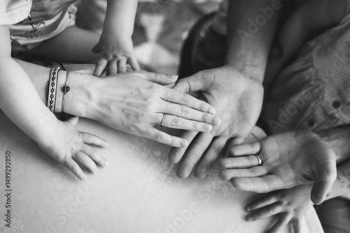 Tableau sur toile Black and white image showing a touching moment of unity and connection as multi