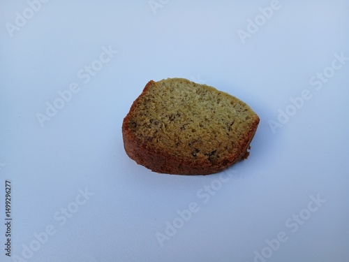 A plate of banana cake, a traditional Indonesian cake made from bananas as the main ingredient, has a soft texture and sweet taste