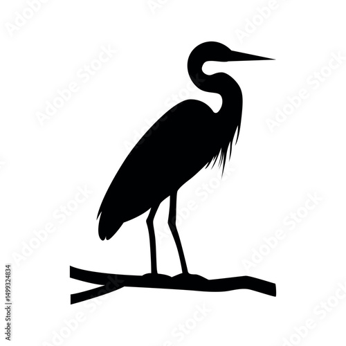 Silhouette of a standing heron bird standing calmly