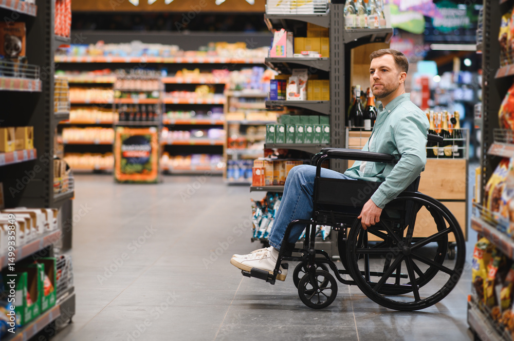 Customer using wheelchair choosing groceries in supermarket Customer using wheelchair choosing groceries in supermarket