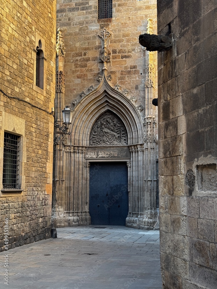 Fototapeta premium Streets of Barcelona glowing in the golden hour light, with warm sunset tones highlighting the architecture and vibrant urban atmosphere. A perfect blend of history, charm, and Mediterranean beauty.