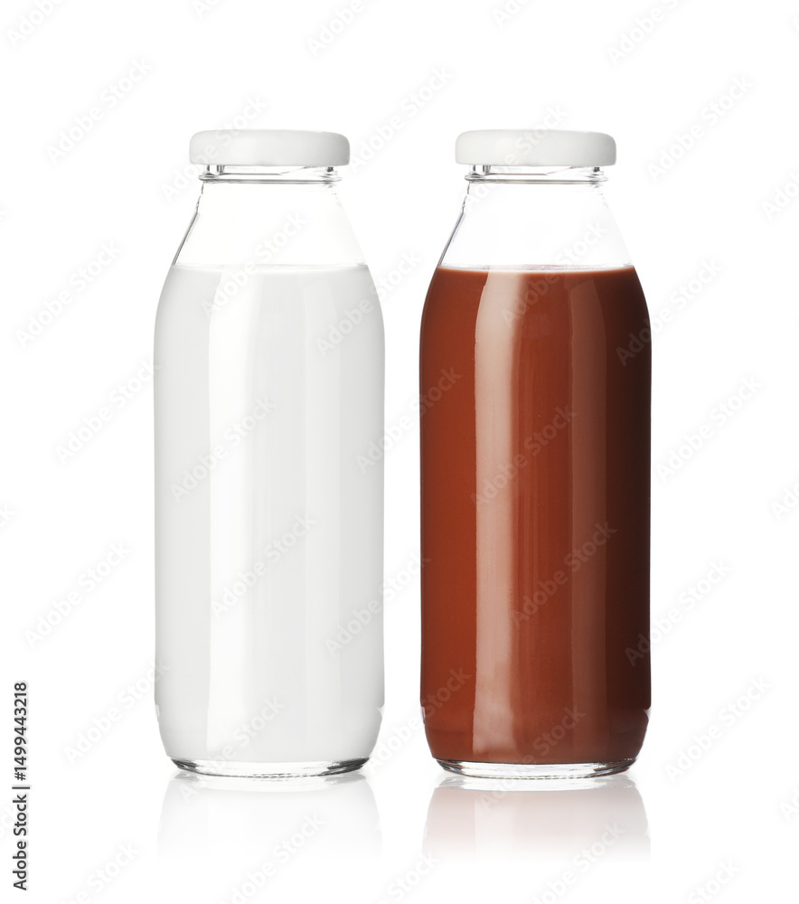 Chocolate drink and milk in glass bottles isolated on white Chocolate drink and milk in glass bottles isolated on white