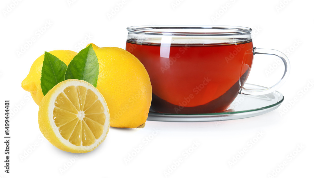 Tea in glass cup and fresh lemons on white background Tea in glass cup and fresh lemons on white background