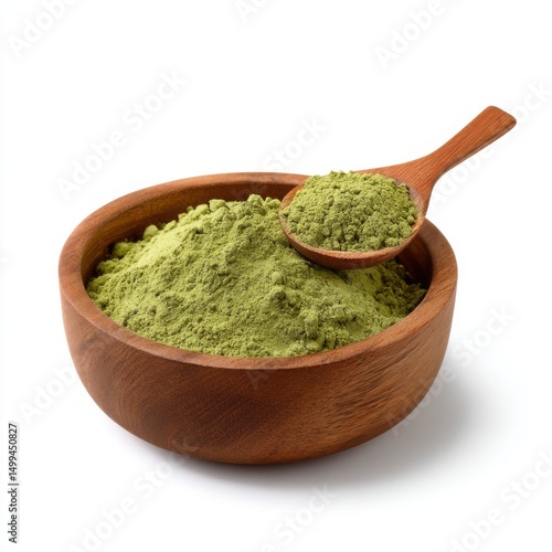 Organic matcha green tea powder in wooden bowl