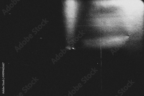 retro film overlay effect with scratch dust and light leaks,retro grain noisy film distressed texture light leak flare on black background	