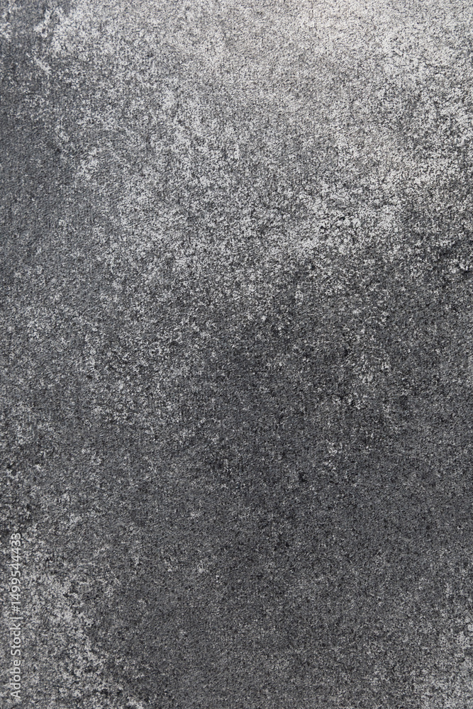 Obraz premium Gray textured surface highlighting subtle variations and patterns in natural stone