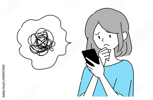 顎に手を当ててスマホを見ながら悩んでいる若い女性
