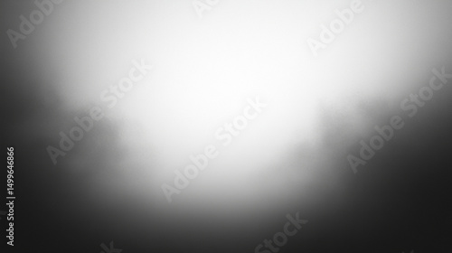 A soft, foggy abstract image in black and white, evoking mystery.