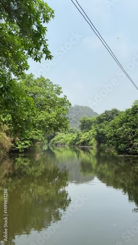 rowing boat tour on the backwaters of Tam Coc, Vietnam