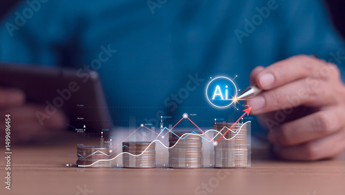 Obraz na płótnie A hand holding a pen pointing at a stack of coins, representing financial decision-making and fintech concept. Suitable for topics like smart investing, digital finance, and business technology. w salonie