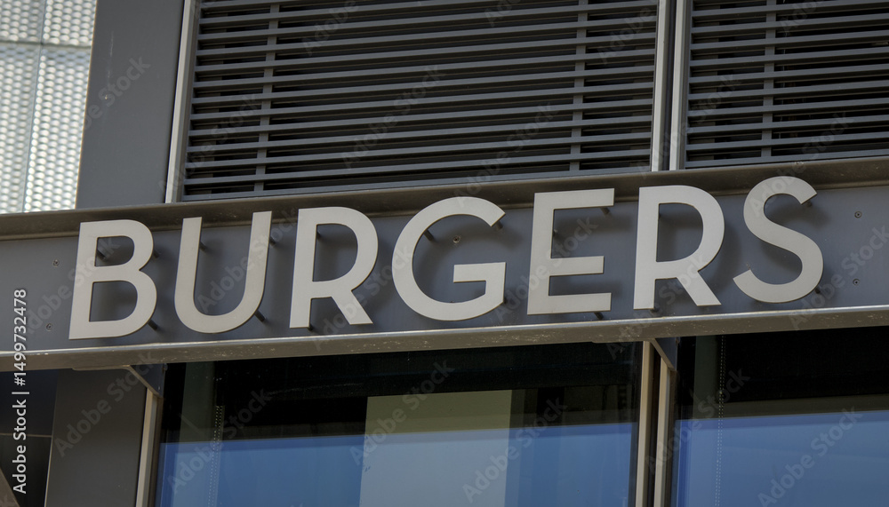 burgers sign on the side of a building in new york city burgers sign on the side of a building in new york city