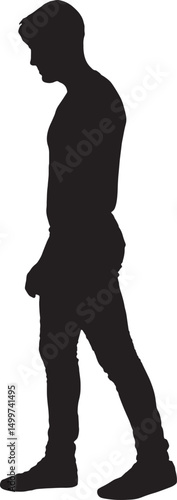 vector silhouette of a side view of a young man walking and looking down