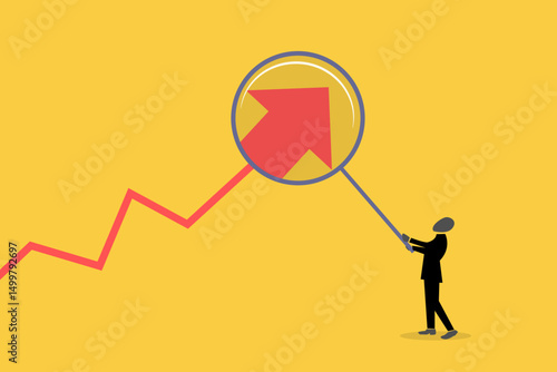 Businessman using magnifying. concept of Business investment, analysis, opportunity,and consulting