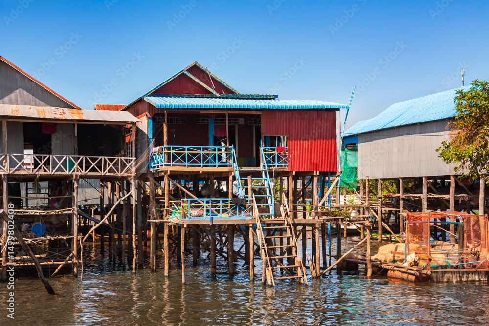 Obraz premium Floating village in Cambodia with traditional wooden houses