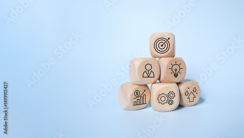 Wood cube with business icon, Start-up, Creativity, Big idea, Business goals management, Investment on new project to wealth, Company strategy target, Sustainable financial plan