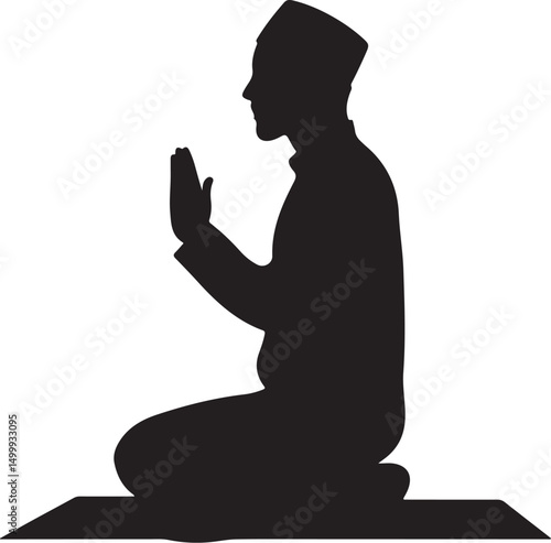 Silhouette of a Muslim man praying on a mat