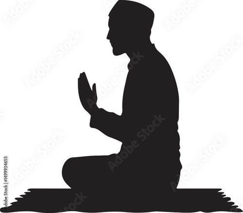 Silhouette of a Muslim man praying on a mat