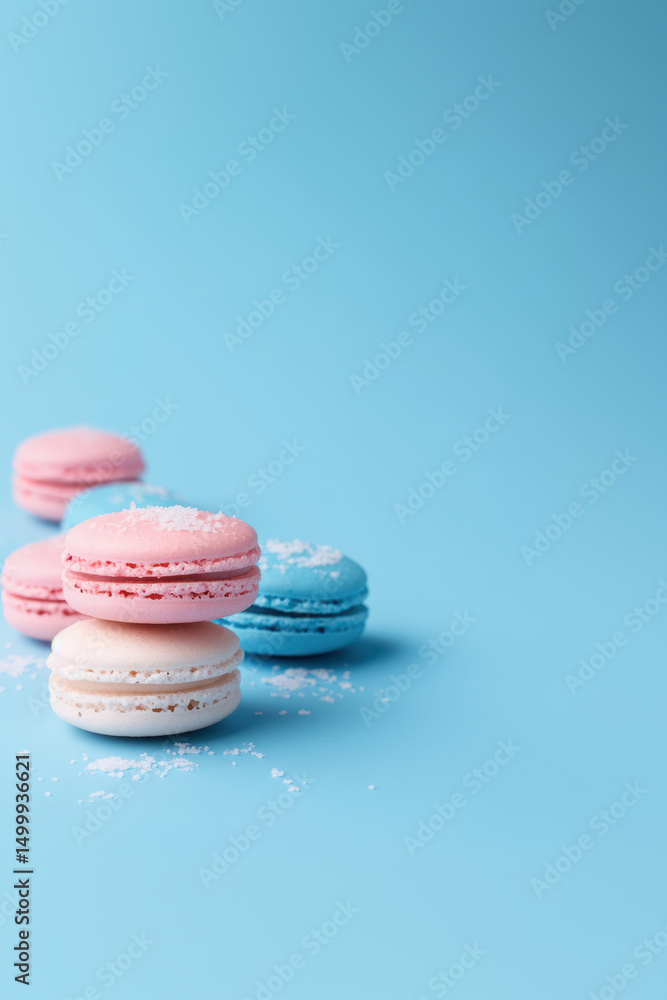 Obraz premium paris macarons sprinkles turquoise background pink