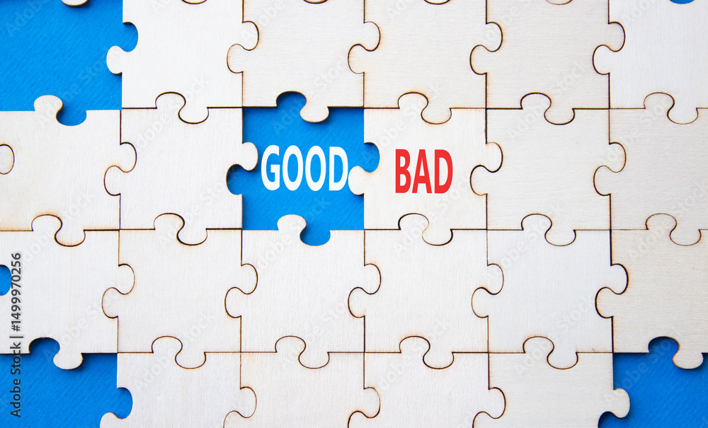 Fototapeta premium Good or Bad symbol. Concept word Good or Bad on wooden puzzle. Beautiful blue background. Business and Good or Bad concept. Copy space