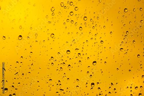 rain in a desert, water droplets on a window glass