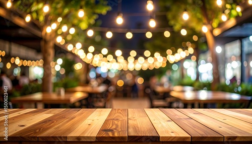 Night cafe with wooden table, and bokeh lights.