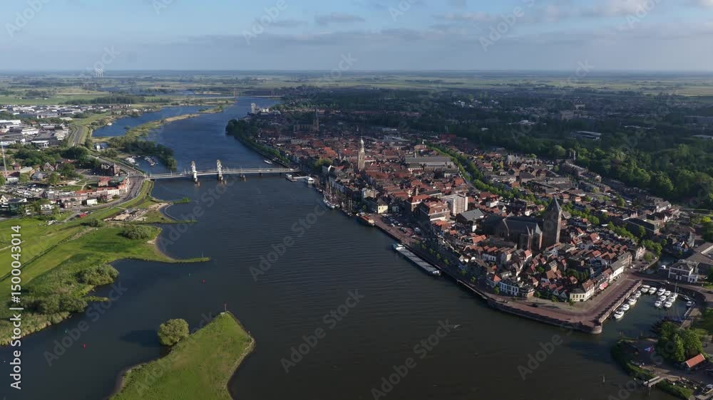 Kampen, The Netherlands, small village along the Ijssel river, city skyline. Bridge, urban landscape, Kampen, The Netherlands, small village along the Ijssel river, city skyline. Bridge, urban landscape,