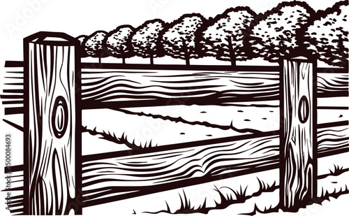Rustic wooden fence with lush trees in a serene countryside landscape