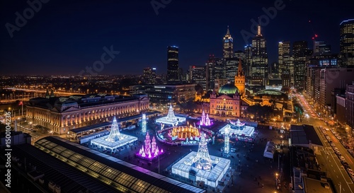 Wallpaper Mural An aerial view of Christmas decorations and lighting in Federation Square, Melbourne, Australia, showcasing the city skyline at night, creating a festive atmosphere in the urban landscape . Torontodigital.ca