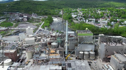 Aerial View of Industrial Paper Mill and Wood Processing Plant in Maine, drone 4k