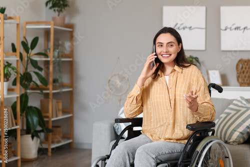 Young woman in wheelchair t...