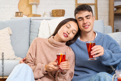 Happy couple with glasses o...