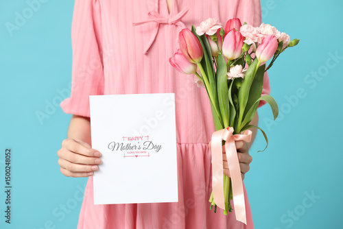 Woman holding card with tex...