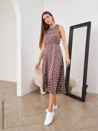 Wallpaper Mural Stylish brunette model posing in casual wear in modern interior setting Torontodigital.ca