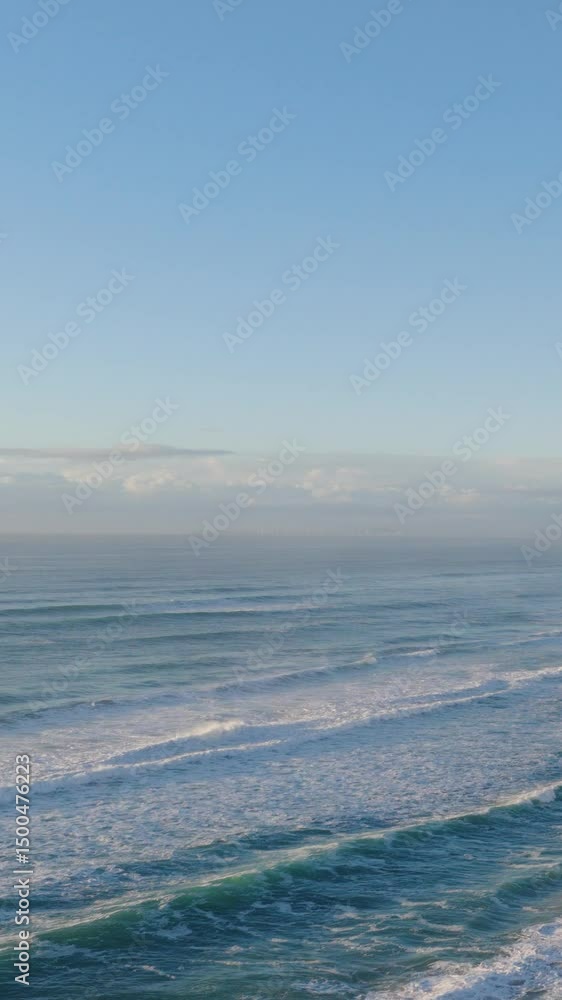 Serene Ocean Waves Under Clear Blue Sky Serene Ocean Waves Under Clear Blue Sky