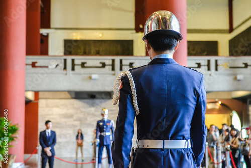 фотографія Back view of a male Asian guard during Guard Changing Ceremony at Chiang Kai-She