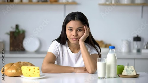 Woman Looking Bored at Breakfast Table