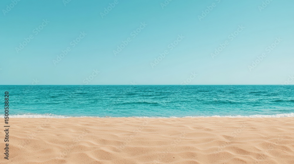 Obraz premium Minimalist beach scene featuring smooth sand meeting vibrant turquoise water under a clear blue sky, creating a serene and idyllic backdrop