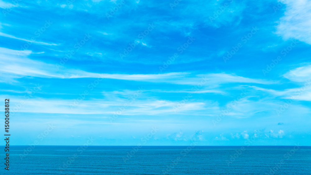 Obraz premium Panorama of cloud clear sky background for summer vacation concept at ocean and summer sea water with sunlight of beautiful cloudy 