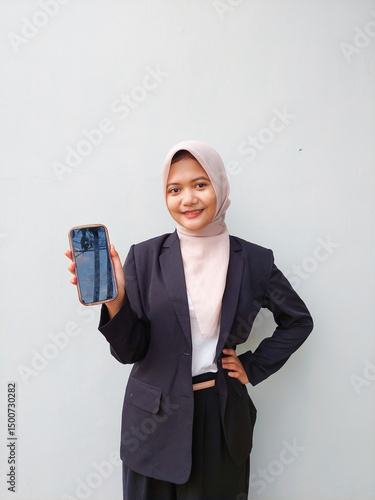 Canvastavla Young Hijabi Entrepreneur Wearing Formal Suit Presenting Mobile Phone Display, S