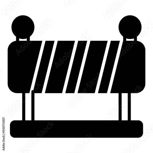 Distinctive block of a striped road barrier, complete with solid lights on top, signifying a closed-off area or warning.